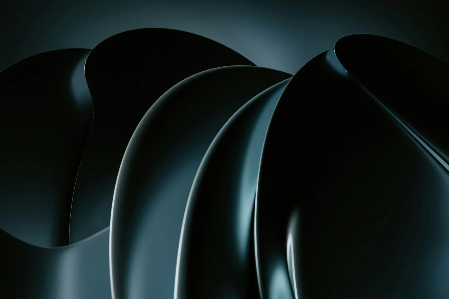 Abstract close-up image of smooth, curved, overlapping metal or plastic surfaces with a dark, reflective finish, reminiscent of Partners Capital's sleek approach to investment models.