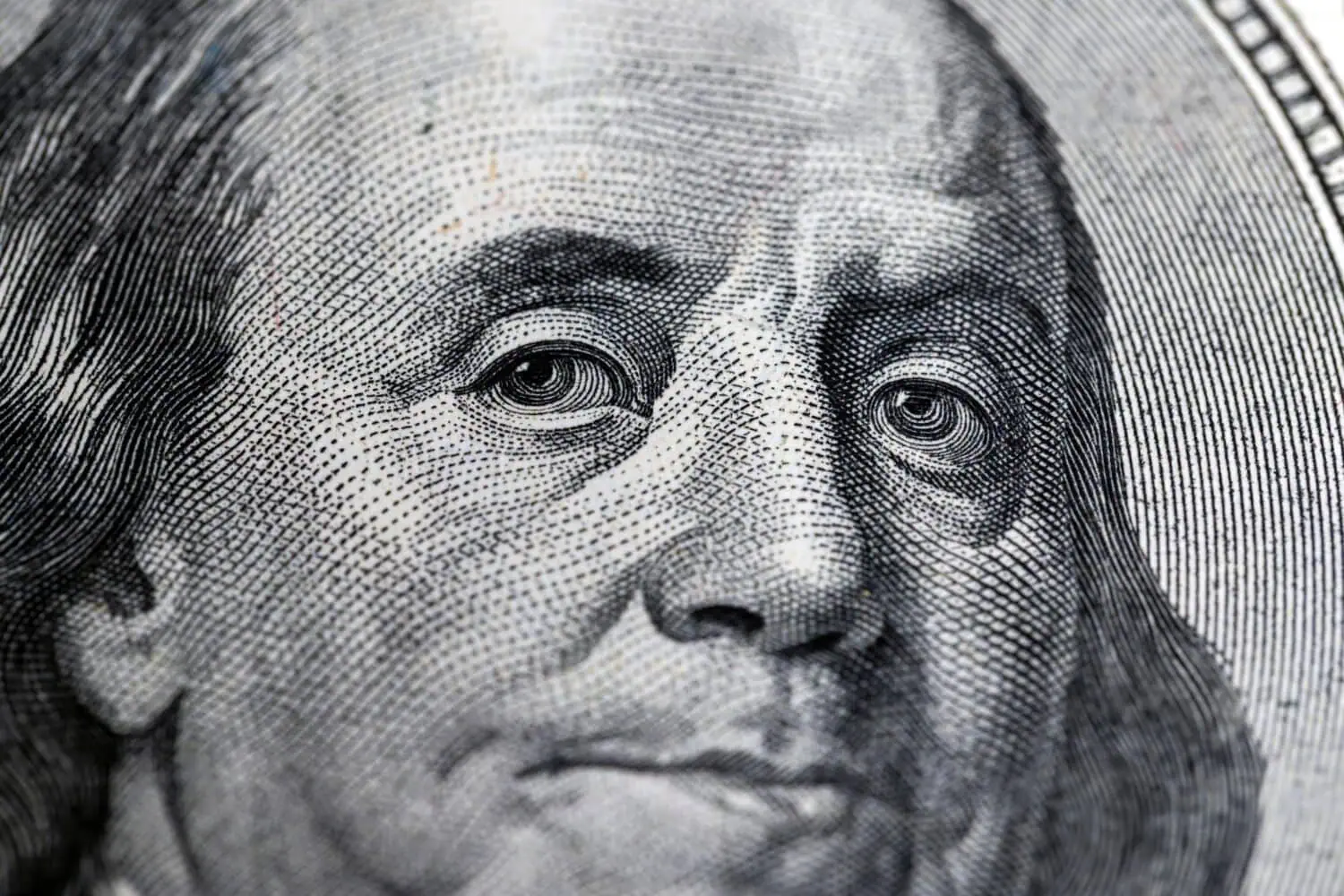 Close-up of a detailed engraving of a face on U.S. currency, showcasing the intricate dot patterns and line work reminiscent of "Art of the Deal" precision.